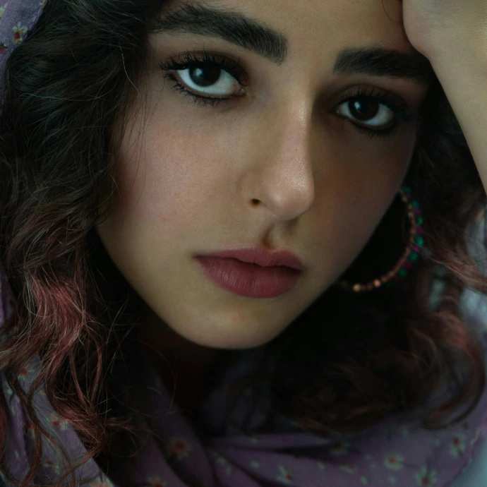 a woman with a scarf around her head